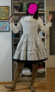Its me wearing a white blouse and the done mpck-up JSK with a petticoat thats slightly too long so it peeks out under the JSK. Its a shot from the front